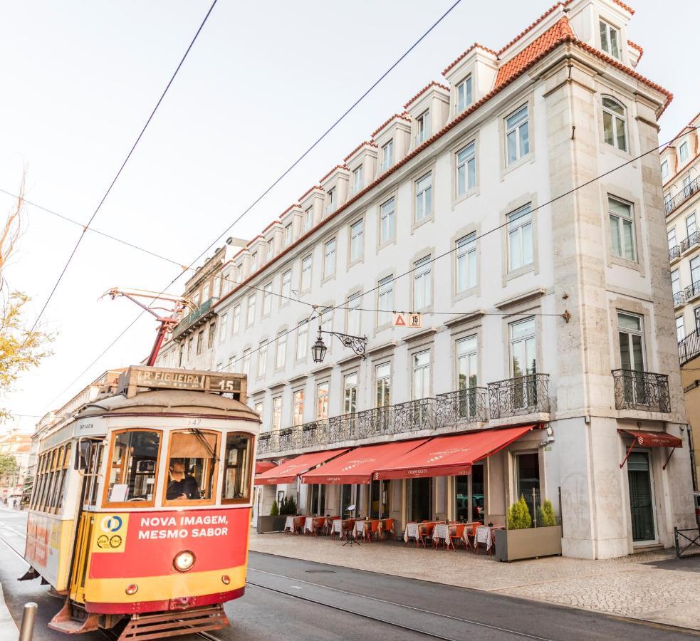 Corpo Santo Lisbon Historical Hotel Exterior photo The 28 tram passing by the restaurant